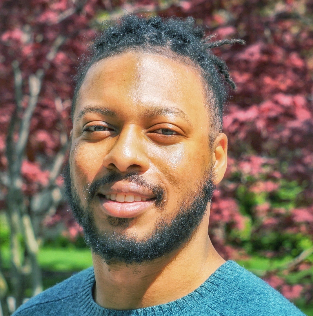 a picture of Chinedu smiling